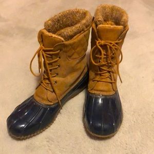 Blue and tan duck boots